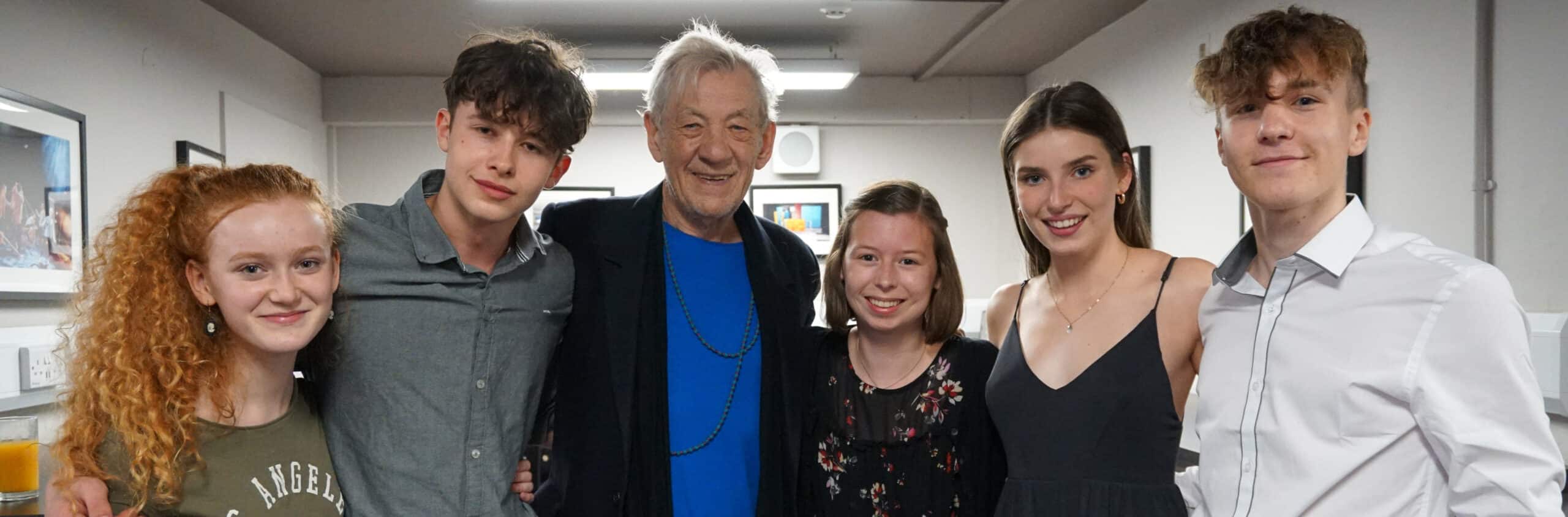 Sir Ian McKellan with five teenage actors