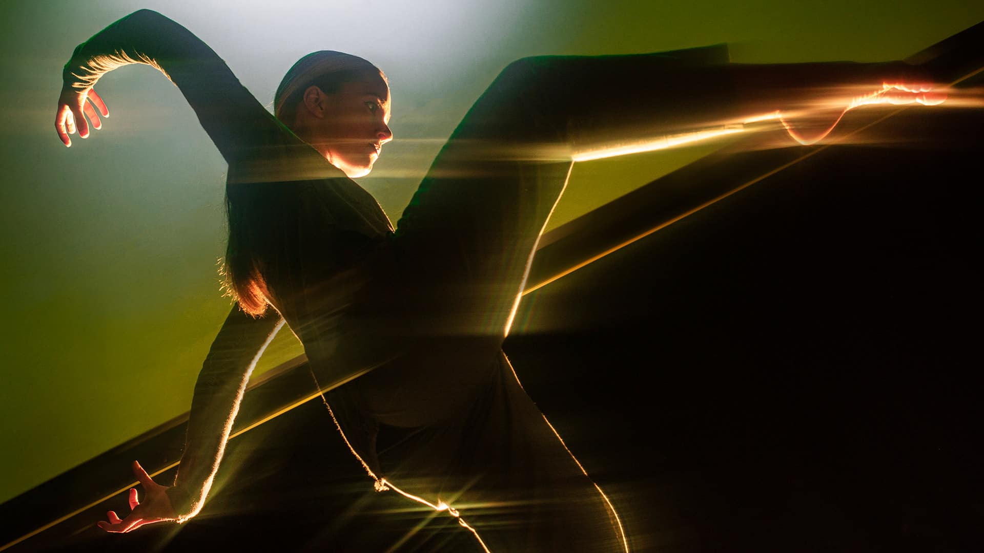 Strong contemporary dance image of Richard Chappell Dance, playing with light and movement